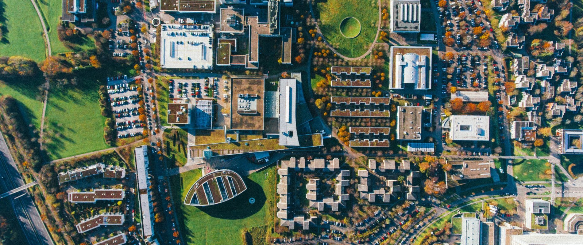 Aerial shot of buildings, roads and trees
